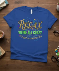 T-shirt with the quote "RELAX WE'RE ALL CRAZY IT'S NOT A COMPETITION" in colorful, playful typography
