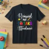 Teacher T-Shirt with the quote "Remind me TO TAKE Attendance" in white script and colorful block letters, featuring an apple