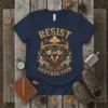 Resist Destruction t-shirt design featuring a bear wearing sunglasses and a ranger hat, with forest and mountain graphics