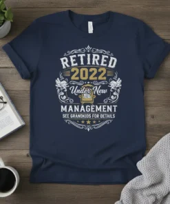 Retired 2022 Under New Management See Grandkids For Details quote on a navy t-shirt, featuring cherubs and a throne graphic