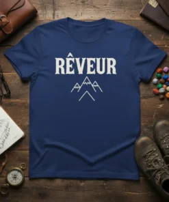 Navy t-shirt with white text "Rêveur" and minimalist mountain graphic, perfect for dreamer and adventurer apparel
