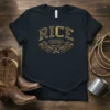 Vintage RICE TEXAS t-shirt design with distressed lettering and western graphics, including a bull skull and crossed rifles
