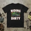 Riding Dirty garbage truck design with bold text and green truck illustration on a black t-shirt