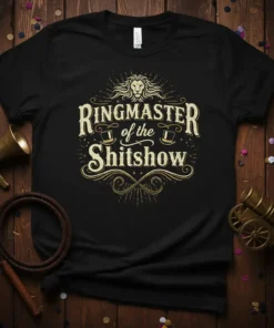 Ringmaster of the Shitshow quote in vintage gold lettering on a black t-shirt, featuring a lion head graphic