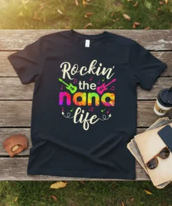 T-shirt with "Rockin' the nana life" text, colorful guitars, and musical notes