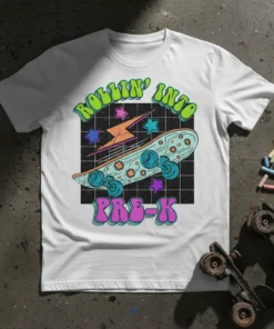 Rollin' Into Pre-K text with a skateboard, lightning bolt, and stars graphic on a white t-shirt