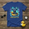Rubber Ducky Cow graphic t-shirt featuring a cow wearing glasses on a yellow duck float with city lights background