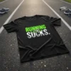 Black t-shirt with "RUNNING SUCKS." design in green and white, featuring a running shoe graphic