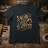 Saddle Up For Success text with horse rider graphic and horseshoe on vintage style t-shirt