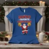 Santa's Favorite Cheerleader text with Santa Claus holding pom-poms on a blue t-shirt, Christmas themed design