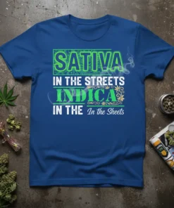 Sativa in the Streets Indica in the Sheets quote on a royal blue t-shirt, featuring green neon text and decorative