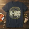 Saturday Faturday T-Shirt with circular graphic of food items like pizza, burgers, and fried chicken