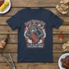 T-shirt design with "Saucy Beaver BBQ" and "IF IT'S NOT ALL OVER YOUR FACE YOU'RE EATING IT WRONG" text, featuring