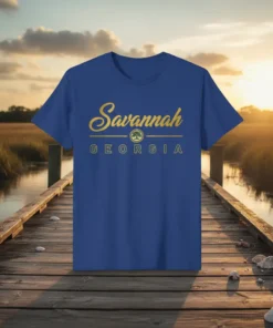 Blue t-shirt with "Savannah GEORGIA" in gold script and block letters, featuring a small tree emblem