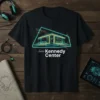 Black t-shirt with neon outline graphic of Kennedy Center and text "Save Kennedy Center"