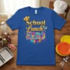 School Lunch HERO t-shirt design with golden chef hat, colorful tie-dye text, and kitchen utensils