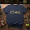 SCHOOL T-Shirt design with golden glittery letters featuring educational icons like books, apple, and compass