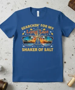 Searchin' For My Long Lost Shaker Of Salt quote with tropical sunset sunglasses and compass graphic on blue t-shirt