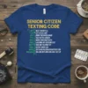 Senior Citizen Texting Code t-shirt with funny texting abbreviations and their meanings in green and yellow text