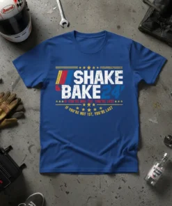Blue t-shirt with "SHAKE & BAKE 24'" and "IF YOU'RE NOT 1ST, YOU'RE LAST" text in white and yellow, inspired