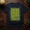 SHAKE SHAKE SHAKE SHAKE SENORA text design with playful green font and whimsical insect and fairy graphics around the letters