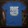 Sharp Knives Matter quote with a chef's knife graphic on a blue t-shirt
