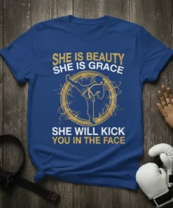 She Is Beauty She Is Grace She Will Kick You In The Face quote on a royal blue t-shirt with