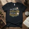 She Works Willingly With Her Hands Proverbs 31:12 quote on black t-shirt with floral wreath design
