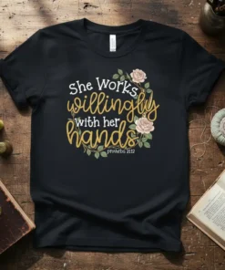She Works Willingly With Her Hands Proverbs 31:12 quote on black t-shirt with floral wreath design