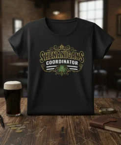 Shenanigans Coordinator text with shamrock graphic on a black t-shirt, perfect for St. Patrick's Day celebrations