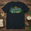 Shenanigans SQUAD text with shamrocks and a horseshoe graphic on a navy t-shirt for St. Patrick's Day