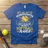 T-shirt with text "She's Not Just My Granddaughter She's Also My Favorite Softball Player" featuring a softball and crossed bats