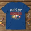 She's My Firecracker patriotic couple t-shirt design with a rocket blasting fireworks, featuring bold typography