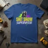 Shit Show Supervisor t-shirt design with a grumpy cat wearing a hard hat and colorful paint splatters
