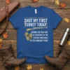 Funny Thanksgiving t-shirt with text "Shot My First Turkey Today" and graphics of a turkey and rifle
