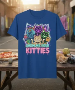 Show Me Your Kitties t-shirt with neon outline featuring four smiling cartoon cats in various colors and yarn balls