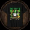 Gnome holding a beer mug with text "Shut Up Liver You're Fine" and shamrocks, St. Patrick's Day graphic tee