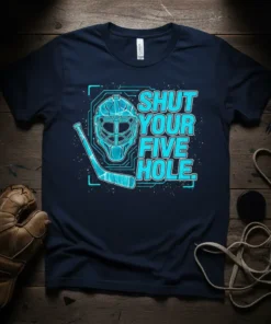 Shut Your Five Hole hockey goalie t-shirt design with a goalie mask and stick graphic