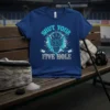 Shut Your Five Hole hockey goalie t-shirt with a blue design featuring a goalie mask and crossed hockey sticks
