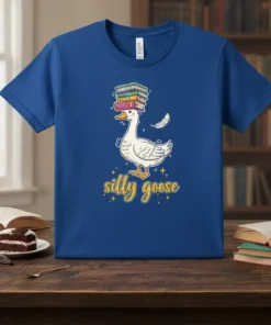 Silly Goose T-Shirt with a cartoon goose balancing a stack of books on its head and the text "silly goose"