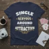 Navy blue t-shirt with distressed white and gold text reading "SINGLE and ready to get NERVOUS AROUND anyone ? find