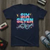 Navy t-shirt with colorful pixelated "SIX SEVEN" text in 80s retro style, featuring lightning bolts and wavy lines
