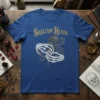 Skelton Hands t-shirt with a golden glitter text and a detailed graphic of skeleton hands holding a rose