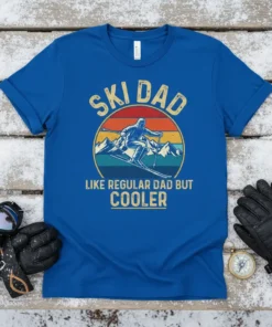 Ski Dad Like Regular Dad But Cooler t-shirt featuring a retro skiing graphic and bold text