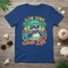 SLOW DOWN Sloth Life text with a cool sloth in sunglasses holding a coconut drink, tropical palm trees, and flowers
