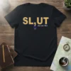 Black t-shirt with yellow and blue text "SL,UT Salt Lake, Utah" and a small colorful graphic below