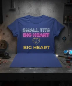 T-shirt with "SMALL TITS BIG HEART BIG HEART" text and a geometric heart graphic in white, pink, and gold