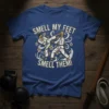 Smell My Feet Smell Them! karate graphic tee with two figures sparring and floral accents