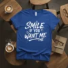 Blue t-shirt with white text "Smile If You Want Me Me" and a coffee cup graphic