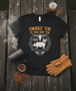 Black t-shirt with "SMOKE 'EM IF YOU GOT 'EM" text and graphic of pig, cow, and chicken in a circular